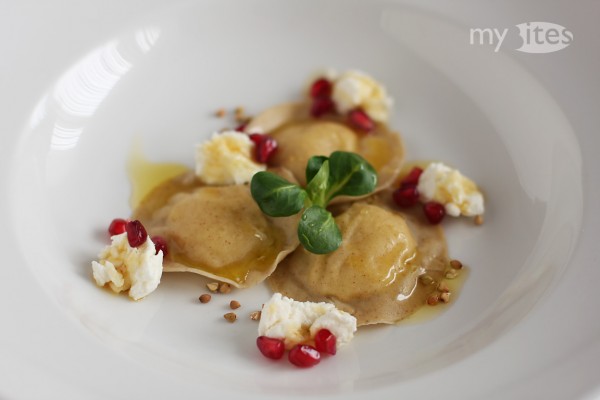 Buckwheat-Celery Ravioli with Goat Cheese, Chestnut Honey, Pomegranate and Orange Butter